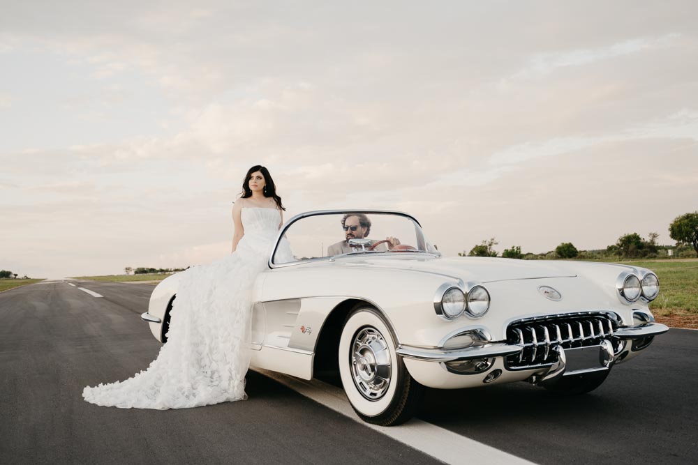 South African Wedding Photography- Bride and groom with cream vintage car- love and fables photography